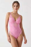 Model wearing pink Seamless Lace V-Neck Bodysuit, front