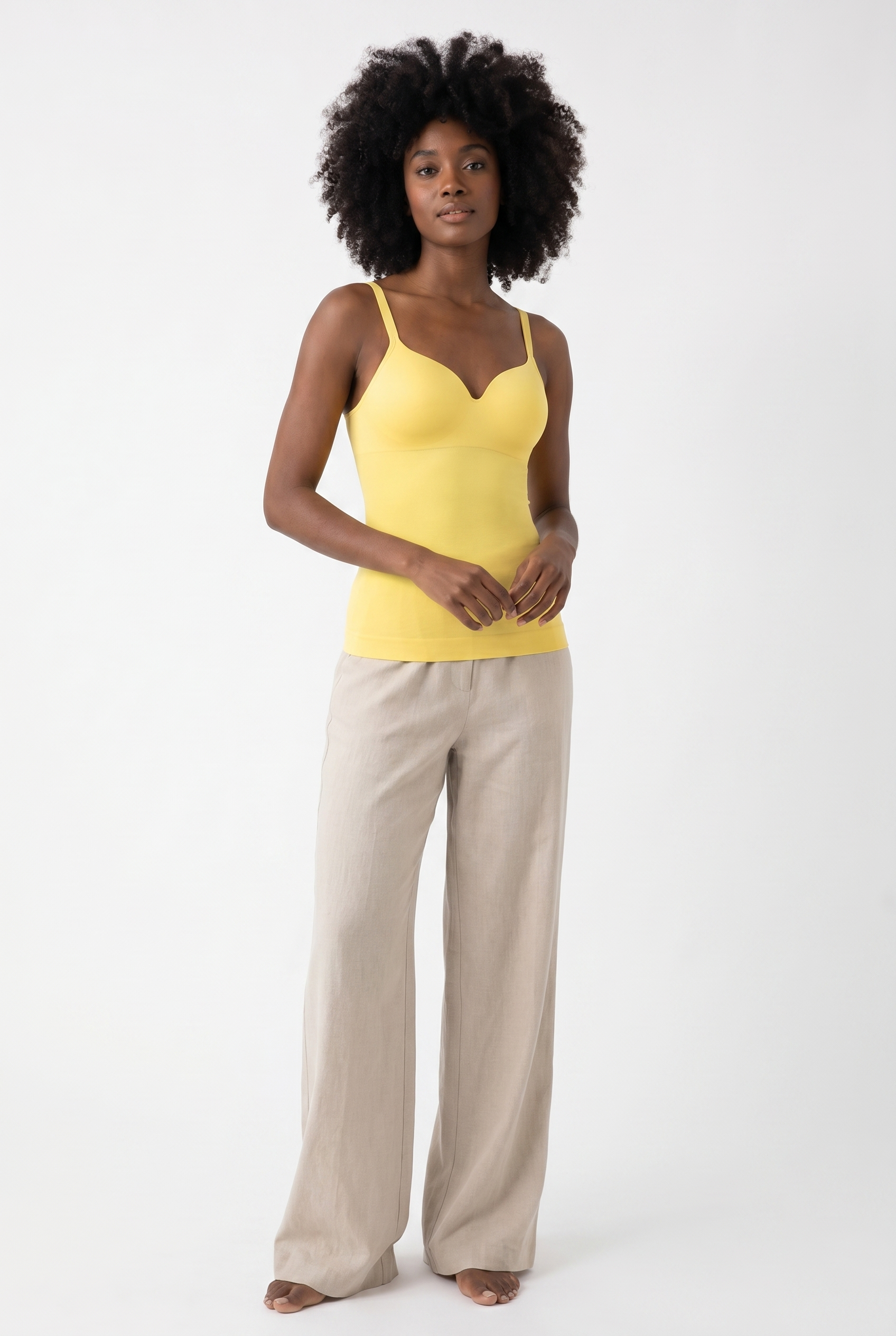 Model wearing built-in bra cami top, front