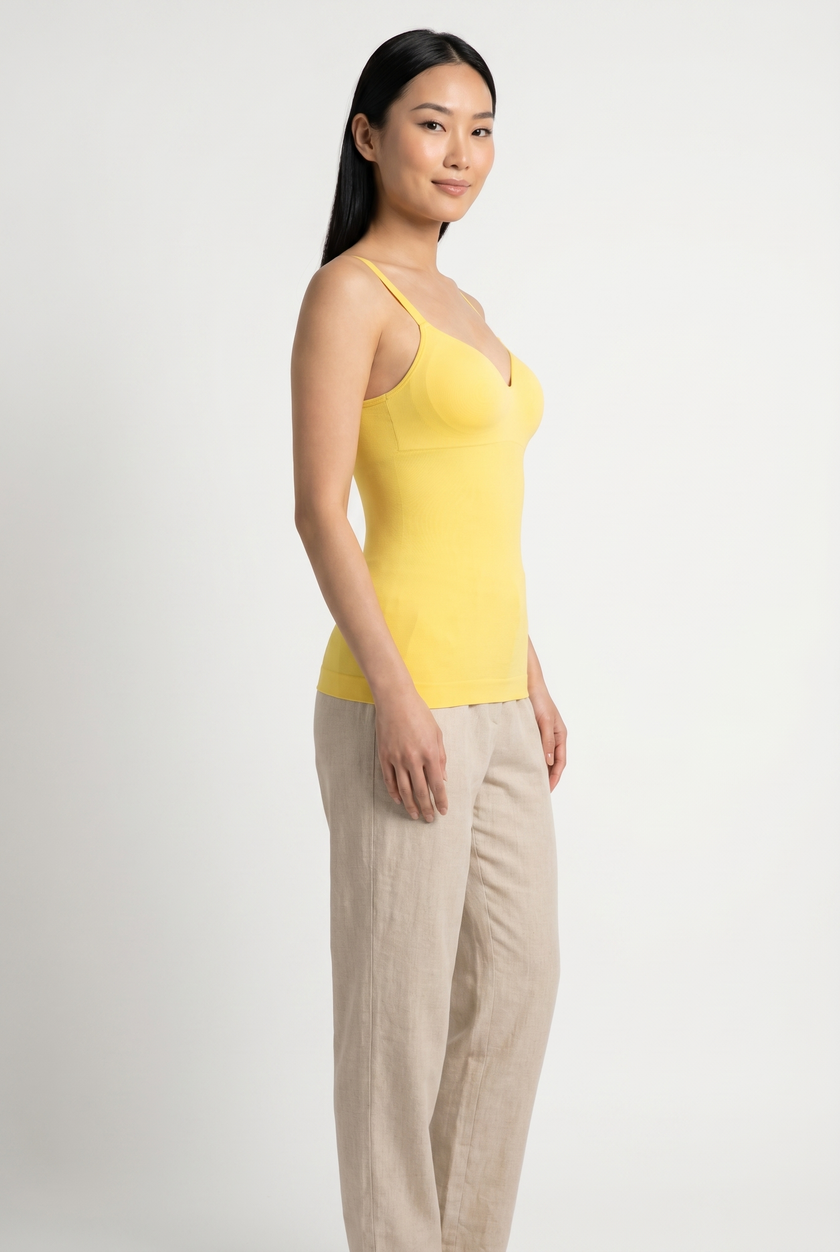 Model wearing cami top, three-quarter angle