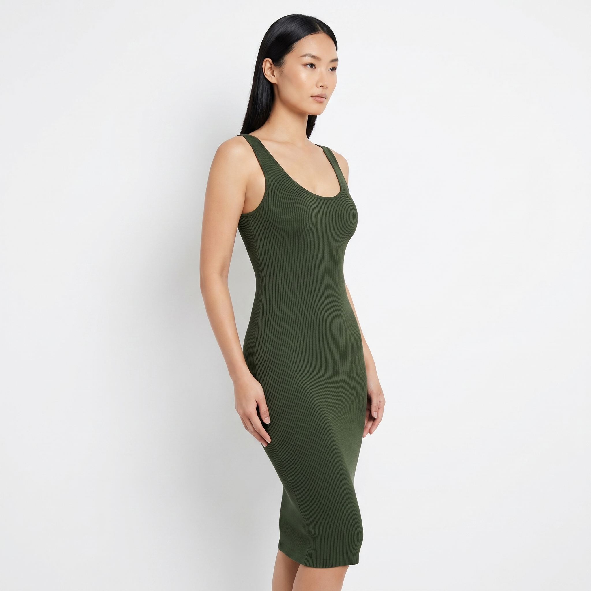 Model wearing olive midi dress, three-quarter angle