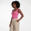 Model wearing modal henley bodysuit, three-quarter angle